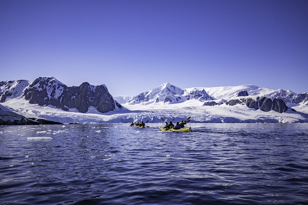 Intrepid Travel Peregrine Adventures Antarctica_Petermann Island_Kayakers_094